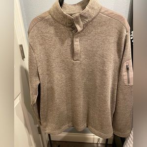Greg Norman 2 button fleece lined pullover.